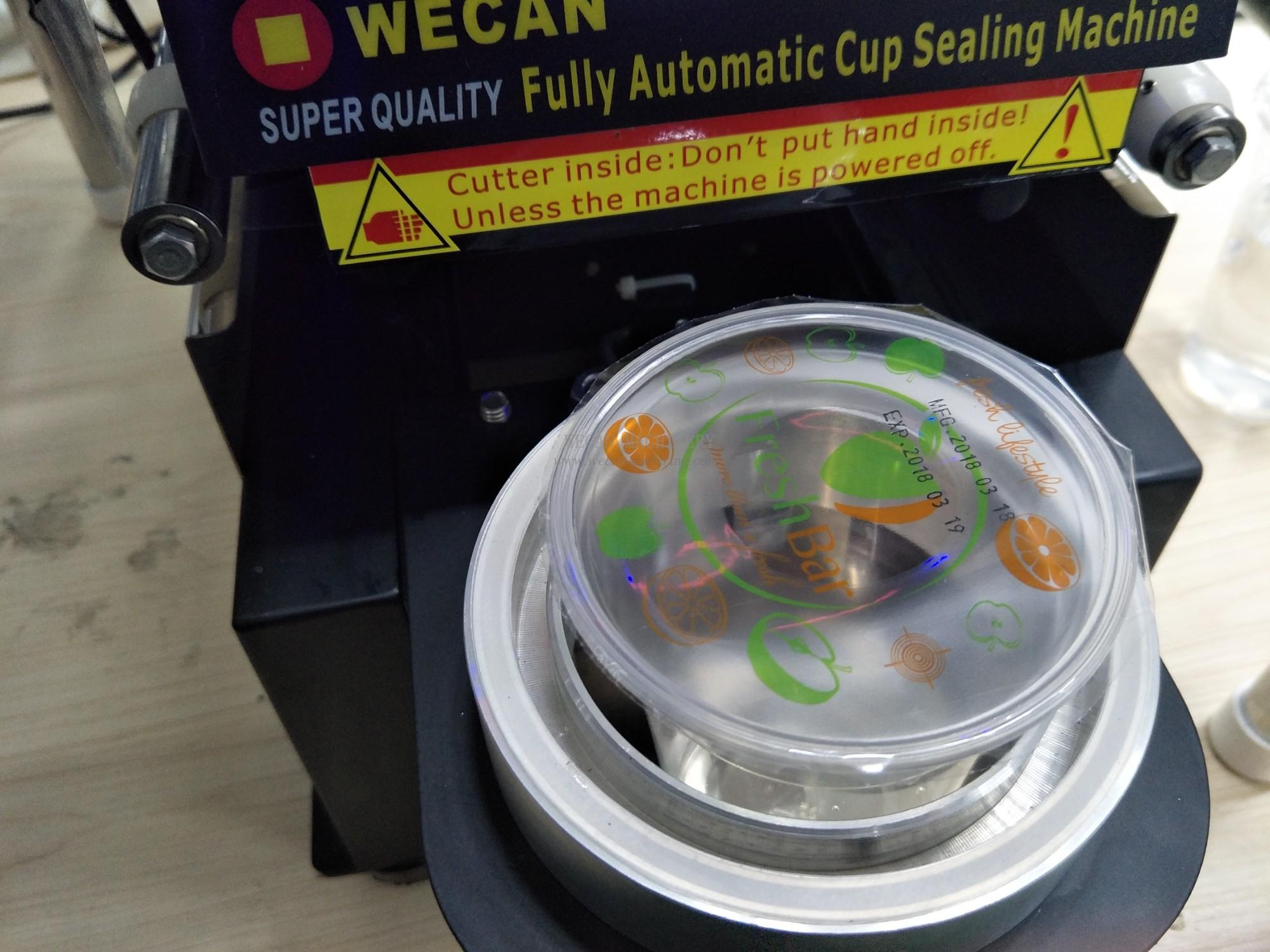 Ice cream cup sealing machine with easily peeled tap